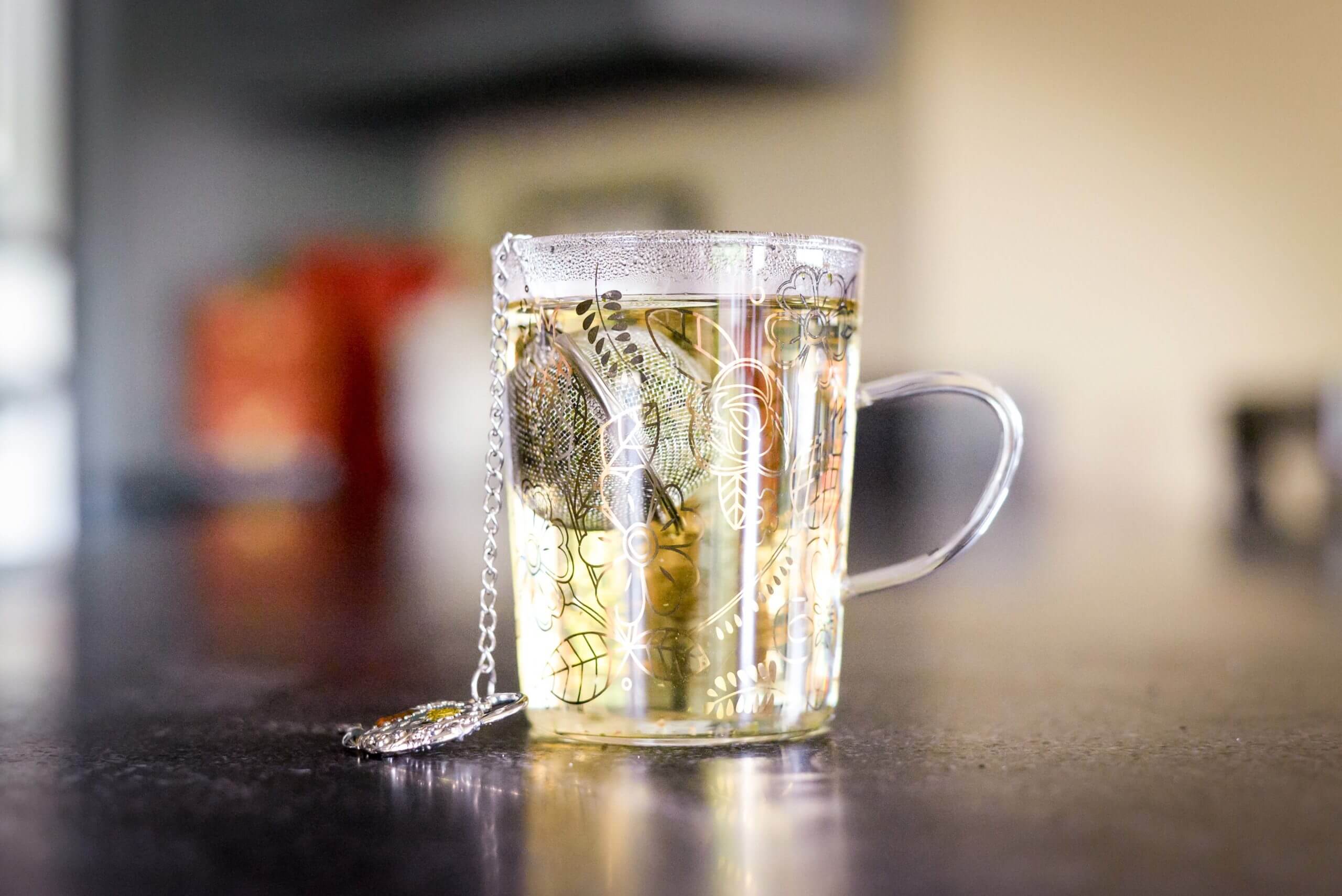 A mug of tea on a table.