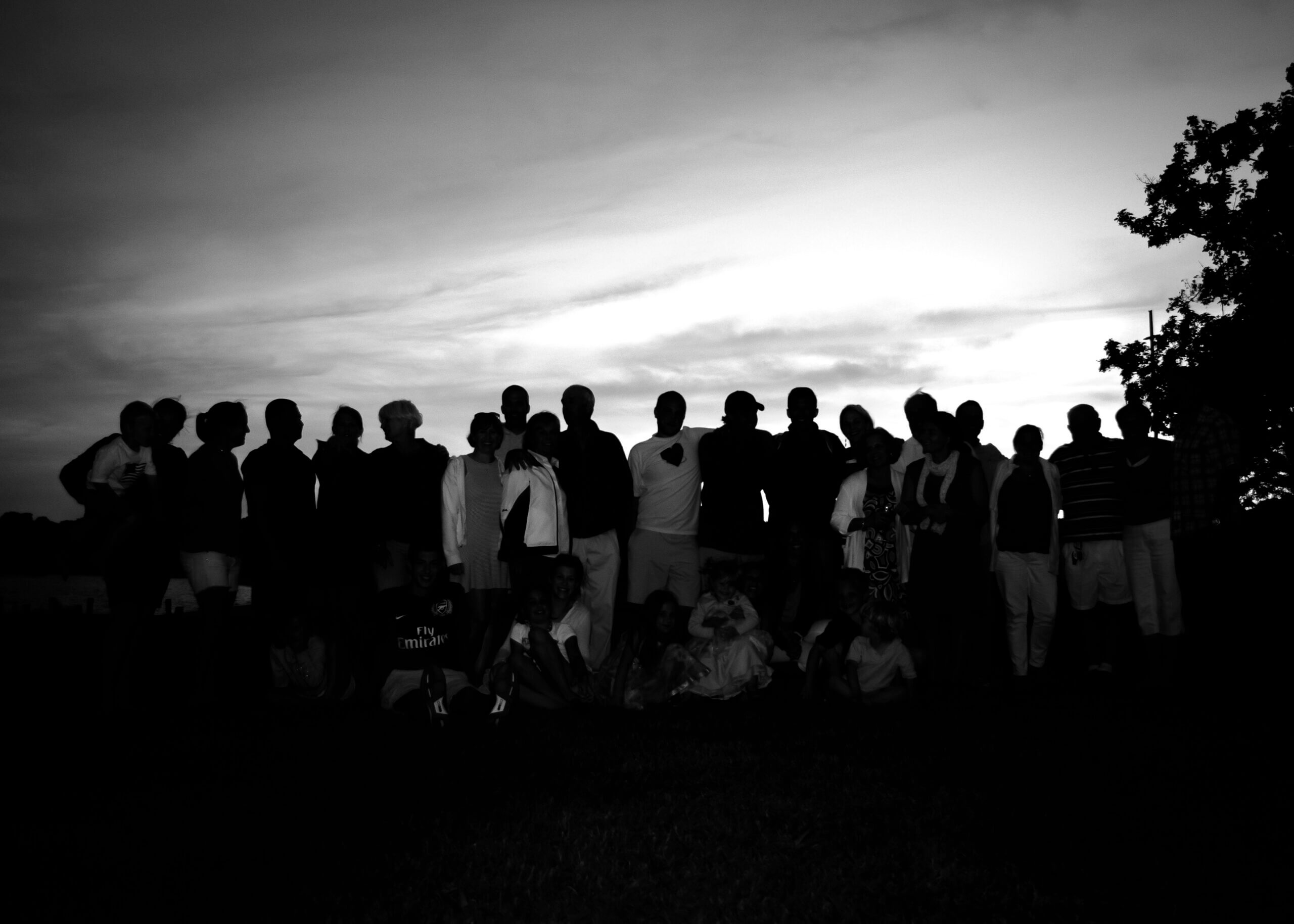 Black and white silhouette of large family photo