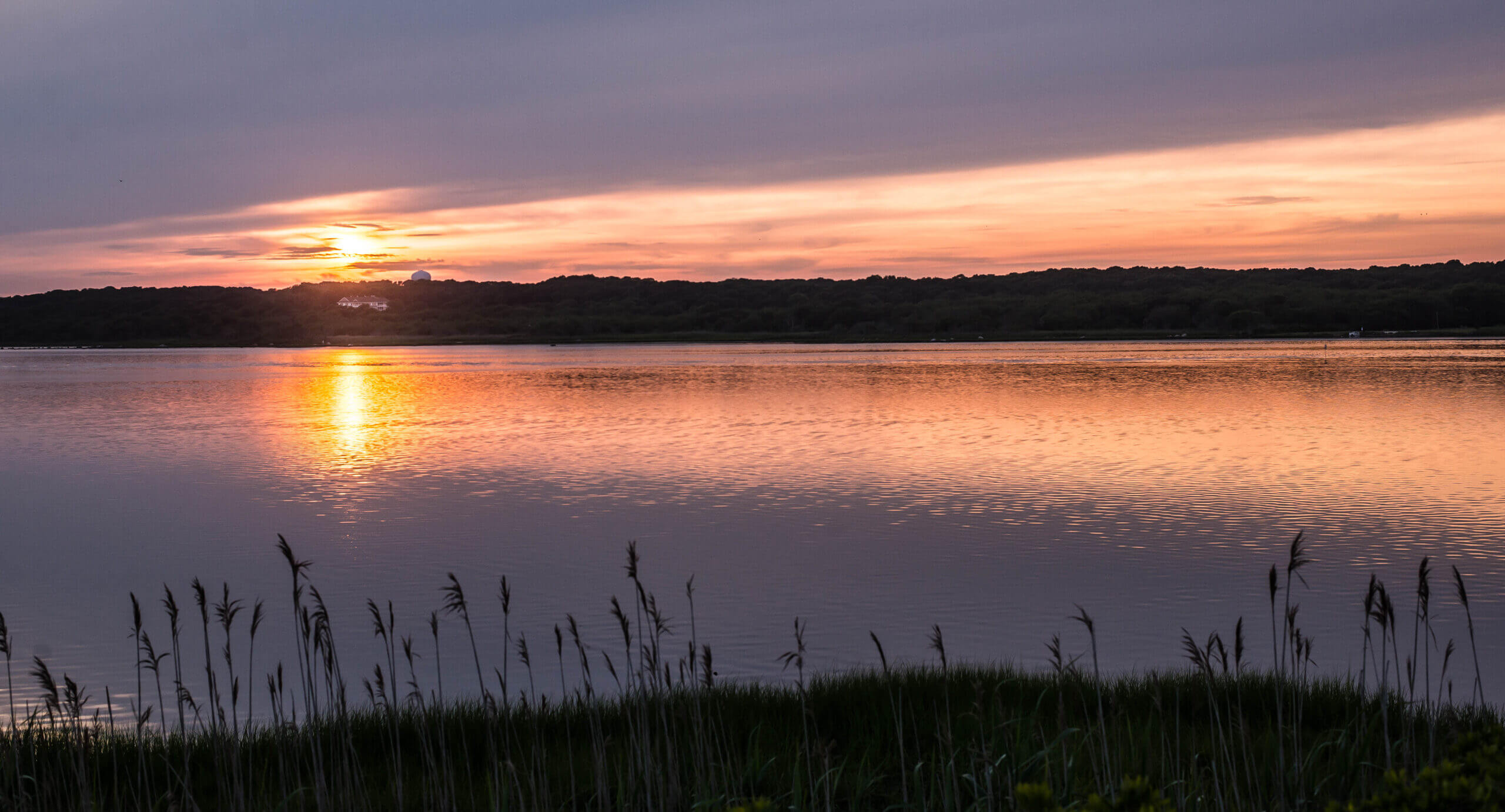 Color image of a sunset of a bay in Rhode Island